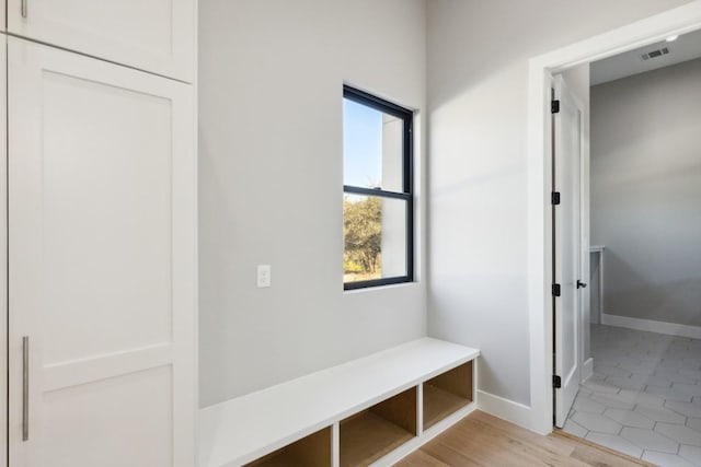 mudroom with light wood-type flooring