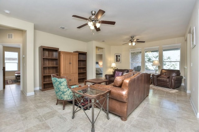 living room with ceiling fan