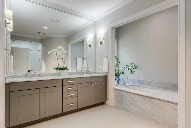 bathroom with a sink, double vanity, visible vents, a garden tub, and ornamental molding