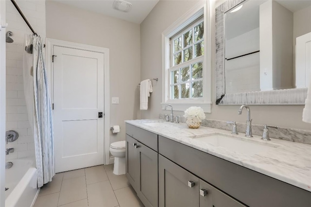 full bathroom featuring tile patterned flooring, shower / tub combo, vanity, and toilet