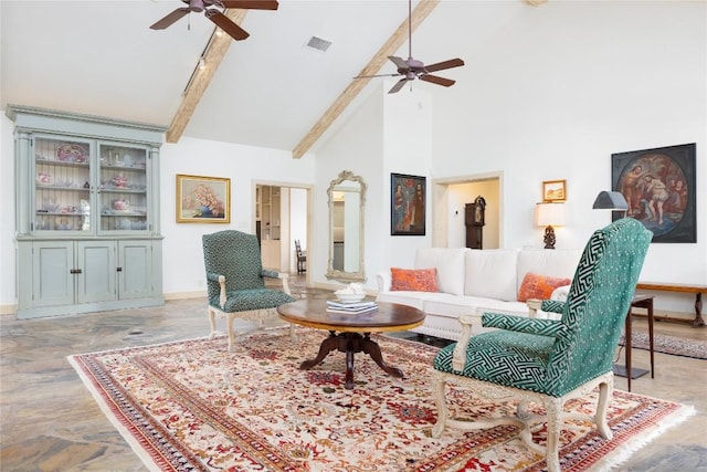 living room featuring beam ceiling and high vaulted ceiling