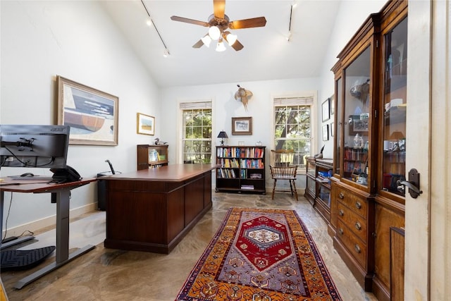 office space with track lighting, high vaulted ceiling, and ceiling fan