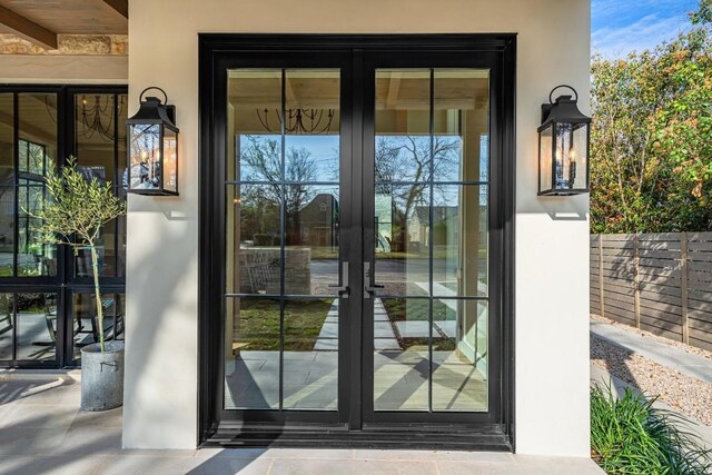 entryway with french doors and beam ceiling