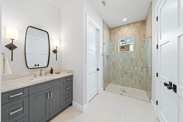 bathroom featuring vanity and walk in shower