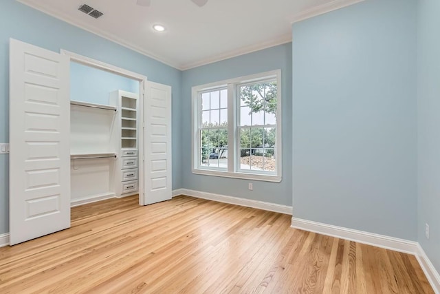 205 Vitex Dr, Lakeway, TX 78734 - unfurnished bedroom featuring crown molding, light wood-style floors, baseboards, a closet, and recessed lighting