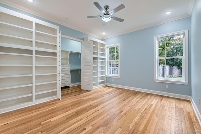 unfurnished bedroom with a closet, ceiling fan, light hardwood / wood-style flooring, and ornamental molding