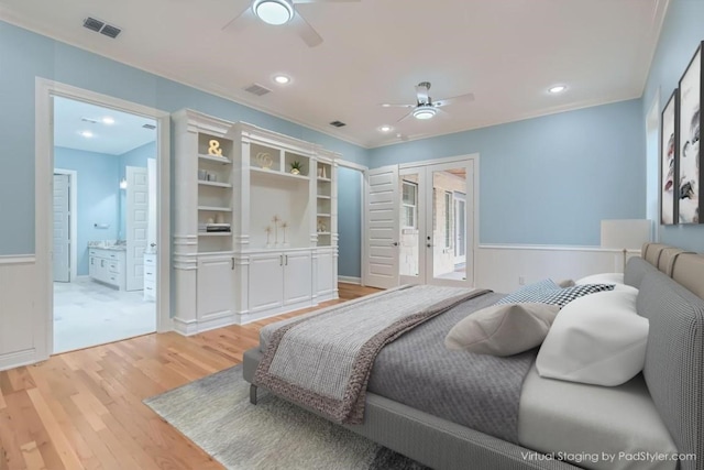 bedroom featuring french doors, ensuite bath, light hardwood / wood-style flooring, and ceiling fan