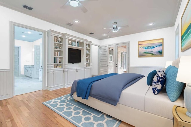 205 Vitex Dr, Lakeway, TX 78734 - bedroom with light wood-type flooring, wainscoting, access to exterior, recessed lighting, and a ceiling fan