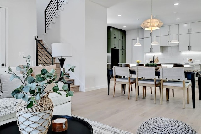 dining space featuring light hardwood / wood-style floors