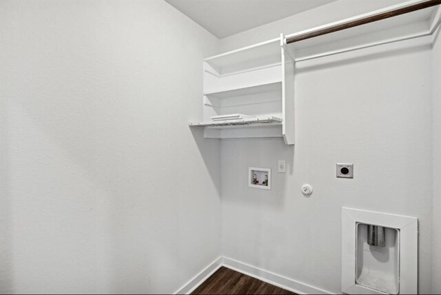 clothes washing area featuring washer hookup, dark wood-type flooring, hookup for a gas dryer, and electric dryer hookup