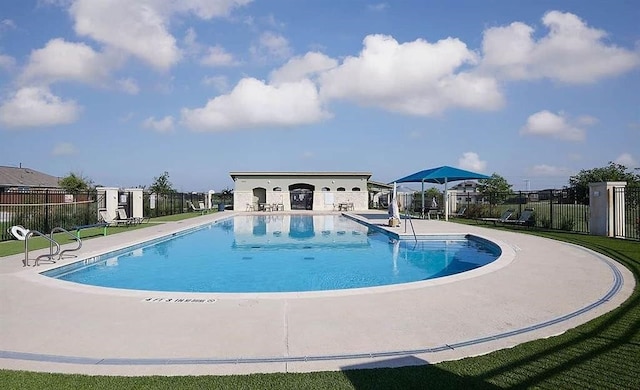 view of pool featuring a patio area