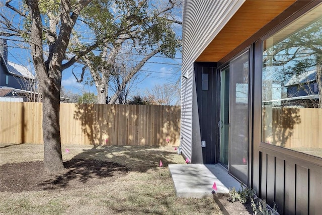 view of yard featuring a fenced backyard