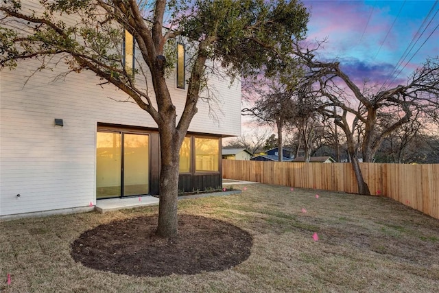 view of yard with a fenced backyard