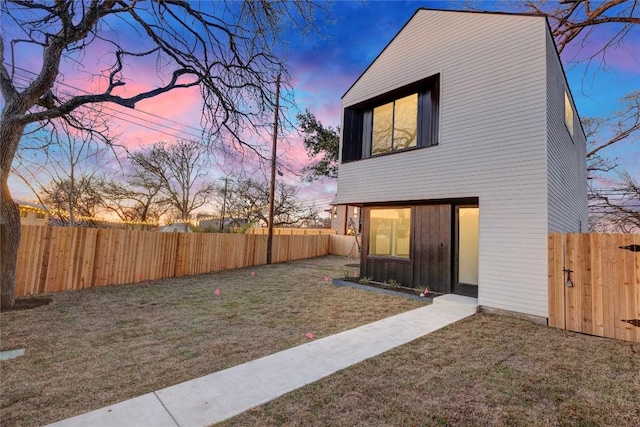 exterior space with a fenced backyard