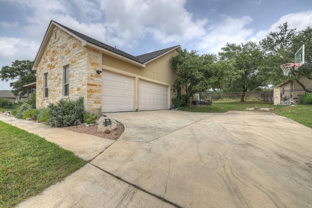 view of side of property with a garage