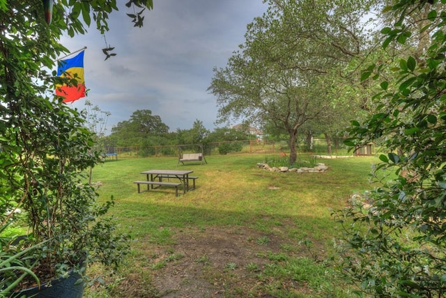 view of yard featuring a trampoline