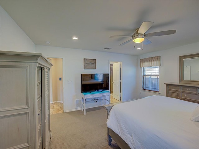 bedroom with light colored carpet and ceiling fan