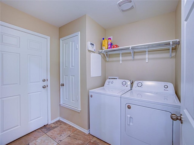 laundry area with washer and dryer