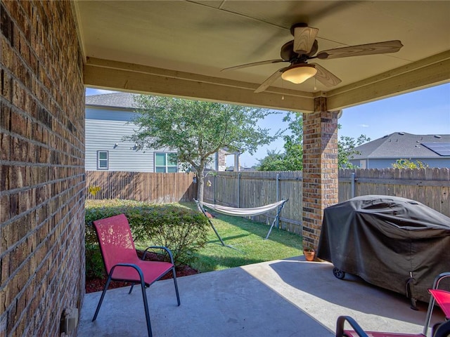 view of patio / terrace with a grill and ceiling fan