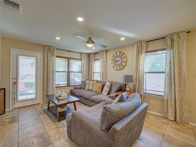 living room with ceiling fan