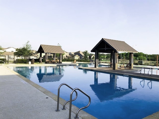 view of pool with a gazebo and a patio area