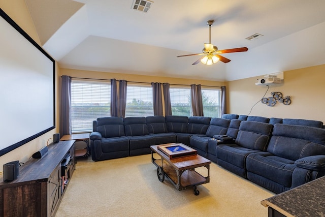 living room with vaulted ceiling, light carpet, and ceiling fan