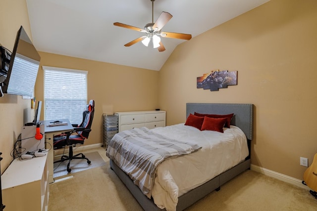 bedroom featuring ceiling fan, lofted ceiling, and light colored carpet