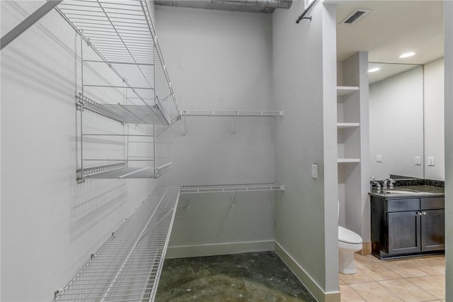 spacious closet with sink