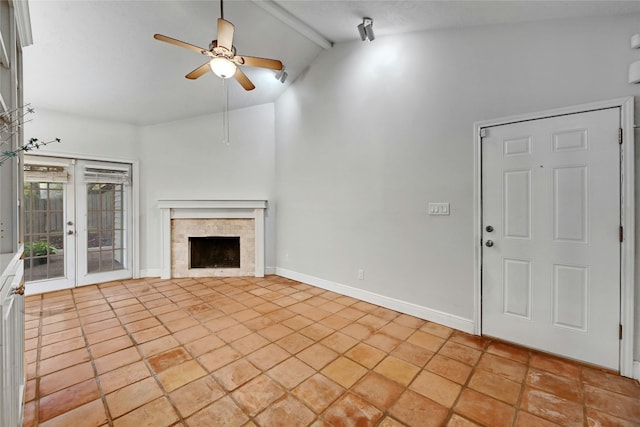 unfurnished living room featuring high vaulted ceiling, french doors, ceiling fan, light tile patterned floors, and beam ceiling