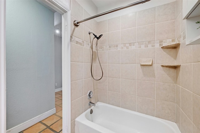 bathroom with tile patterned flooring and tiled shower / bath combo