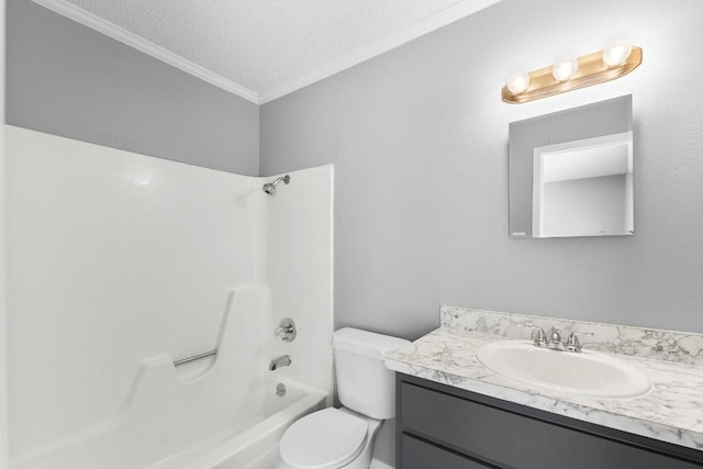 full bathroom featuring vanity, a textured ceiling, crown molding, washtub / shower combination, and toilet