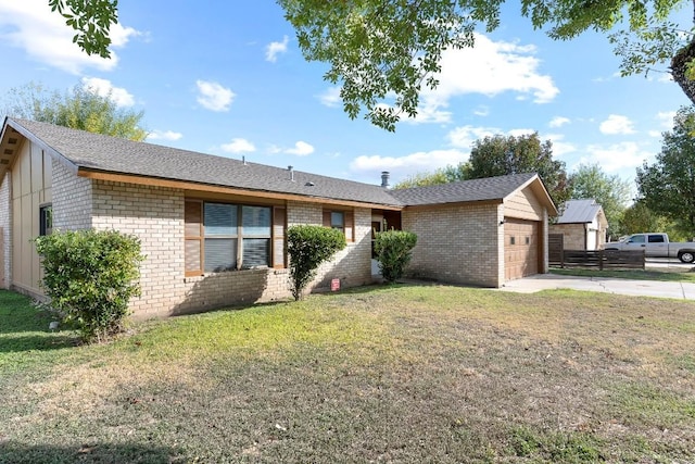 single story home featuring a garage and a front yard