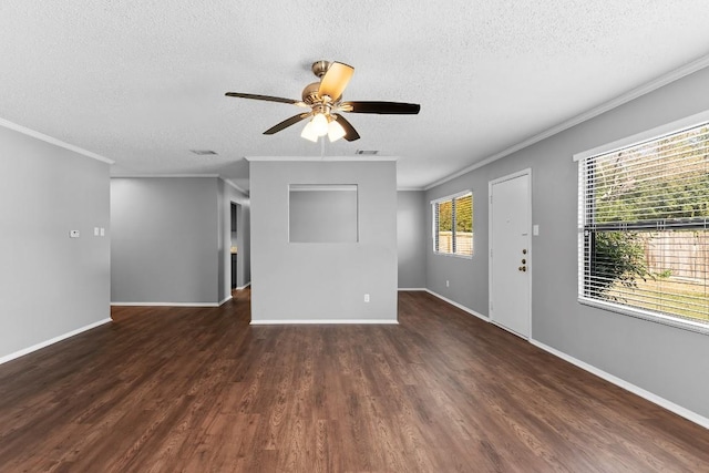 unfurnished living room with ornamental molding, a textured ceiling, ceiling fan, and dark wood-type flooring