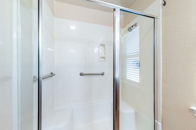 bathroom with walk in shower