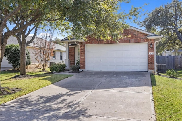 view of front of home with a front yard and central AC unit