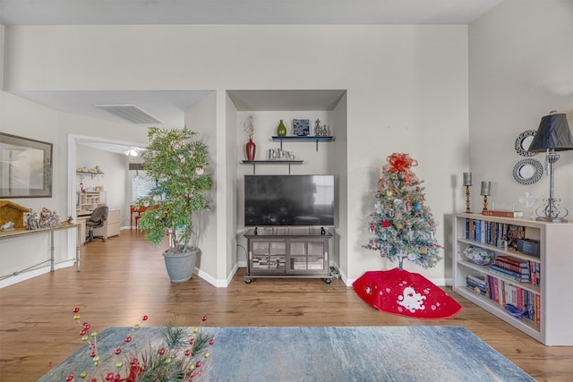 living room with hardwood / wood-style floors