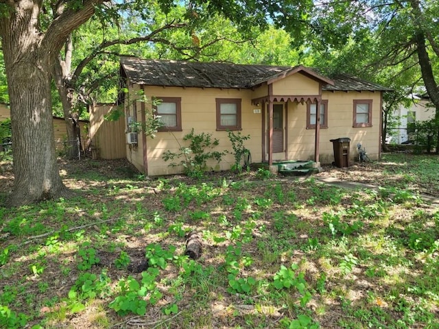 single story home with cooling unit