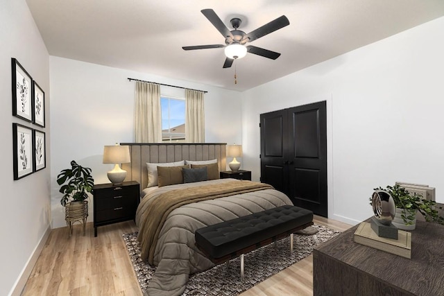 bedroom featuring ceiling fan and light wood-type flooring