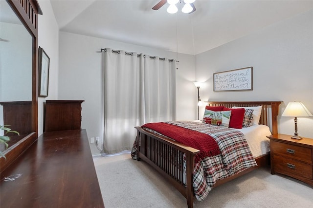 bedroom with ceiling fan and carpet