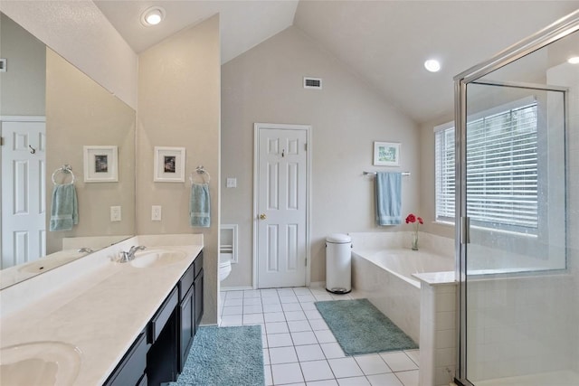 full bathroom featuring vanity, high vaulted ceiling, tile patterned floors, toilet, and shower with separate bathtub