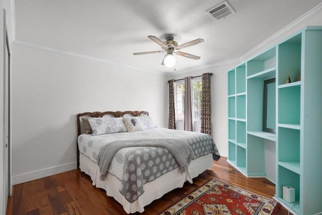 12809 Meehan Dr, Austin, TX 78727 - bedroom featuring wood finished floors, ceiling fan, and crown molding