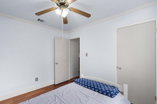 12809 Meehan Dr, Austin, TX 78727 - bedroom featuring wood finished floors, ornamental molding, and a ceiling fan