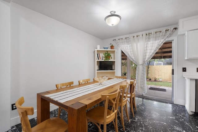 12809 Meehan Dr, Austin, TX 78727 - dining space featuring dark marble finish floors