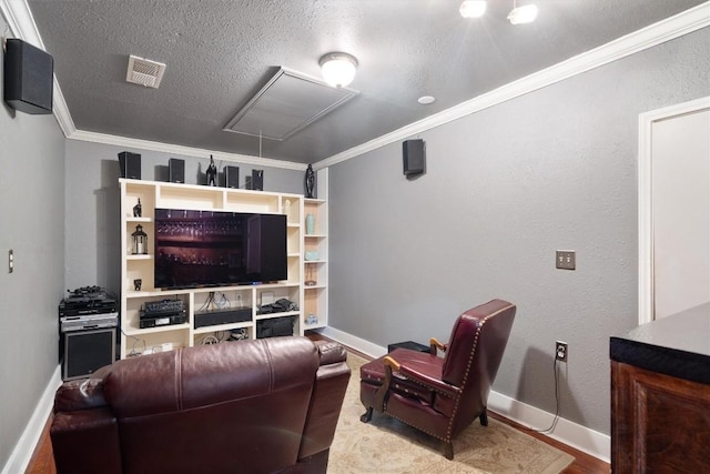 12809 Meehan Dr, Austin, TX 78727 - cinema room featuring ornamental molding and a textured ceiling
