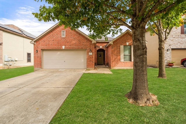 view of front of house featuring a garage and a front lawn