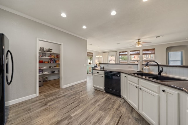 kitchen with white cabinets, sink, dishwasher, stainless steel fridge with ice dispenser, and light hardwood / wood-style floors