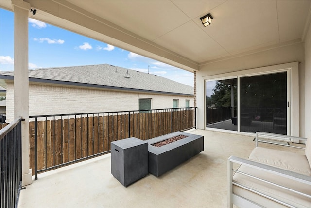 view of patio / terrace with a fire pit