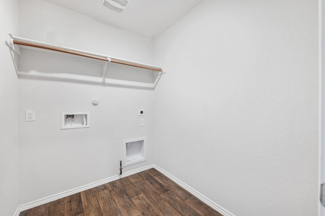 laundry room featuring hookup for a gas dryer, dark hardwood / wood-style flooring, washer hookup, and hookup for an electric dryer