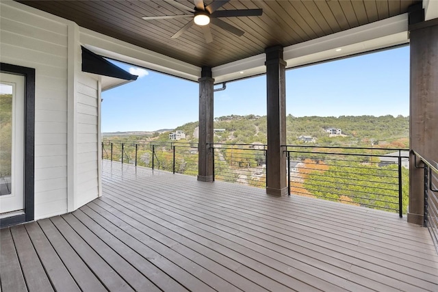 wooden terrace with ceiling fan