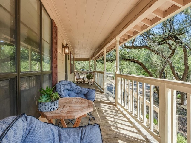 balcony featuring covered porch